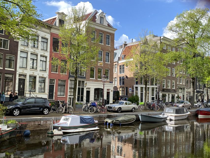 Amsterdam: Guided Off-The-Beaten-Track Walking Tour - Dam Square and the making of Amsterdam