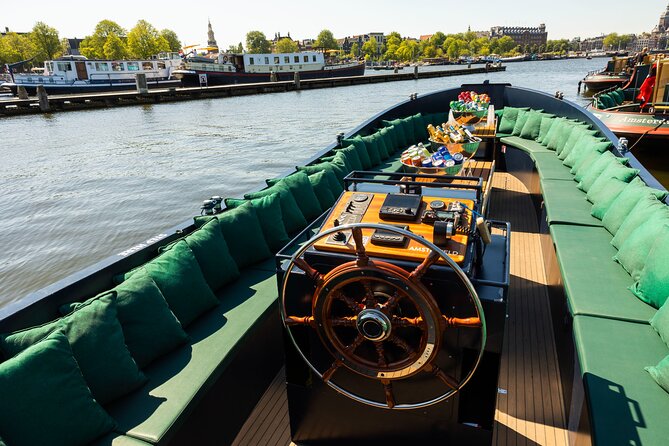 Amsterdam: Guided Open Boat Canal Cruise Unlimited Drinks Option - Key points before you book