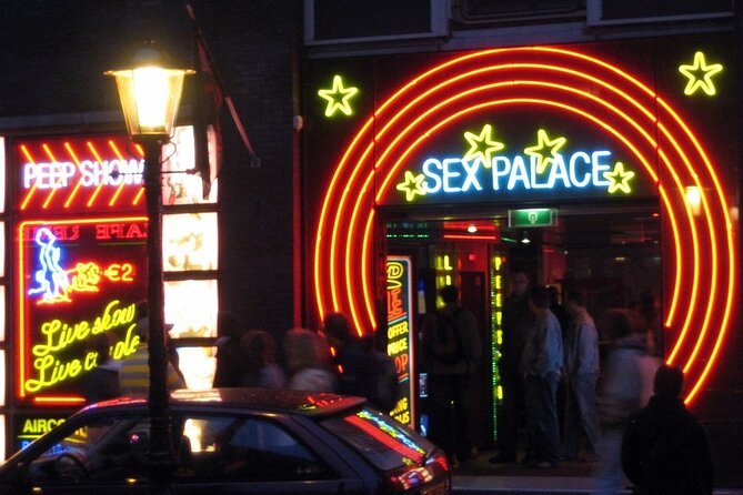 Amsterdam: Guided Red Light District and City Walking Tour - The smallest house and a practical look at city life