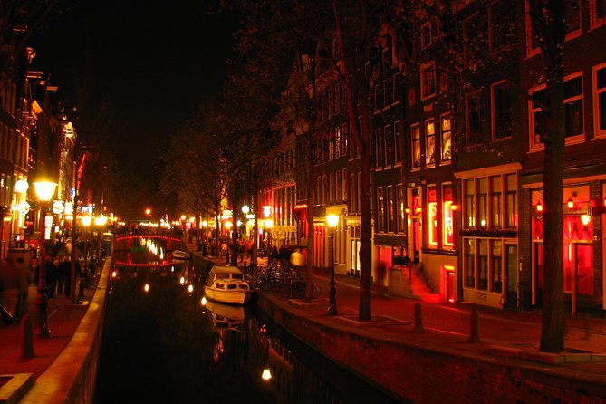 Amsterdam: Guided Red Light District and City Walking Tour - The Condomerie and the tour’s more playful side