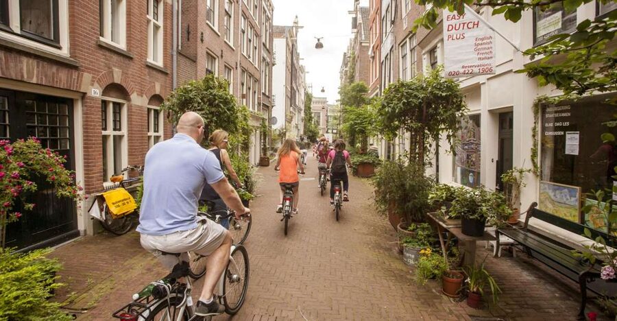 Amsterdam: Hidden Gems & Highlights Guided Bike Tour - The Café Pause and the Value of a Slower Middle
