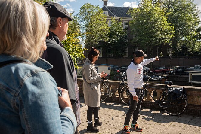 Amsterdam Highlights and History Walking Tour (MUST DO) - What the guide adds to the experience