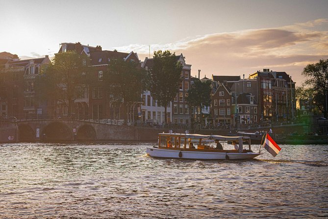 Amsterdam Highlights Canal Cruise with a Drink - Old Town architecture from the water