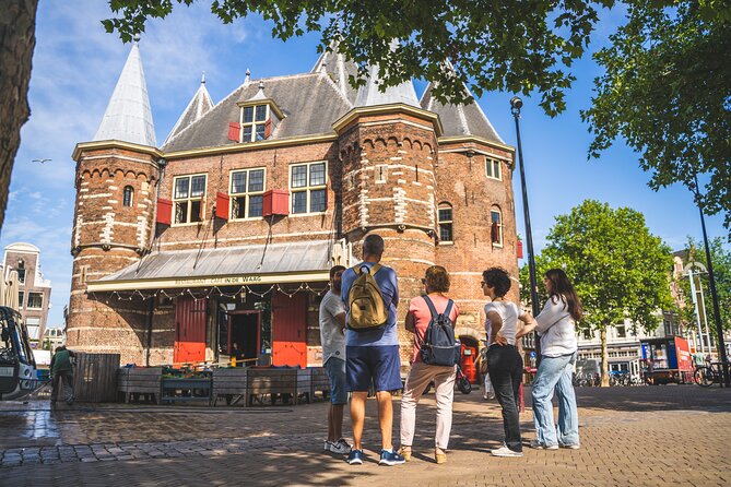 Amsterdam Highlights Small-Group Walking Tour - Dam Square and the royal center