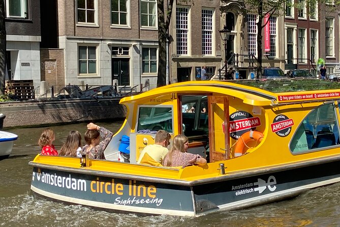 Amsterdam: Historic City Sightseeing Canal Cruise - A church, Centraal Station, and the IJ