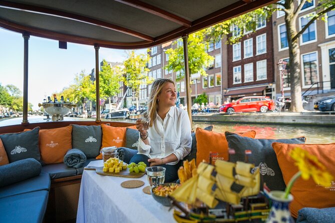 Amsterdam Historic Tour On Classic Saloon Boat - A church, the opera house, and the modern city