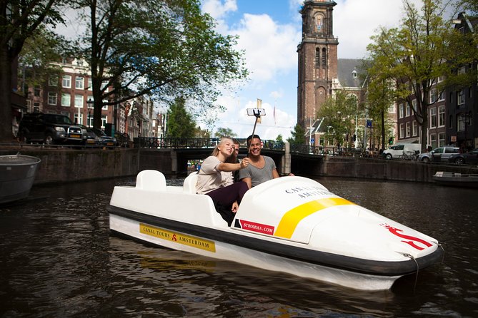 Amsterdam Independent Sightseeing by Pedal Boat - A small boat and a very open plan