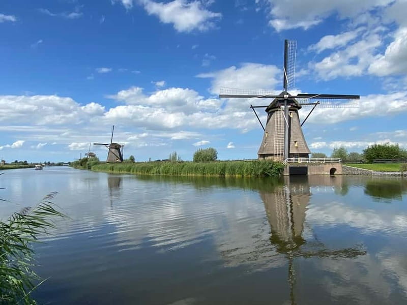 Amsterdam: Kinderdijk, Euromast, Delft and Den Haag Day Tour - Four sides of Holland in one long day