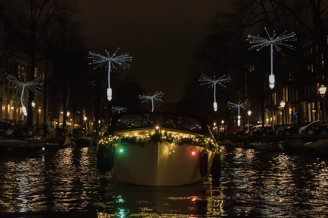 Amsterdam Light Festival: Canal Cruise + Bite & Unlimited Drinks - Seeing Amsterdam’s Light Festival from the water