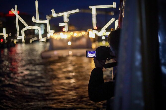 Amsterdam: Light Festival Cruise with Unlimited Drinks Option - NEMO’s bold shape after dark