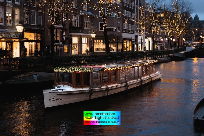 Amsterdam Light Festival: Heated Boat Cruise + Hot Drinks & Bite - Seeing Amsterdam Light Festival from the canal