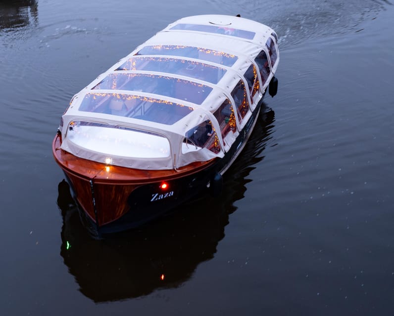 Amsterdam: Light Festival Heated Cruise & Unlimited Drinks! - Finding the boat at Stationsplein