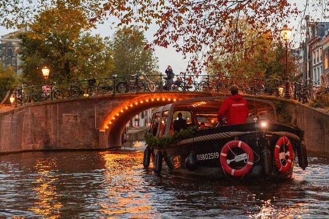 Amsterdam: Light Festival Open Boat - Unl. Drinks Option - The Maritime Museum and the city’s seafaring past
