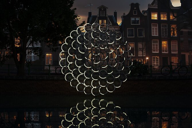 Amsterdam: Light Festival Open Boat - Unl. Drinks Option - Mokumboot and the meaning of a smaller boat
