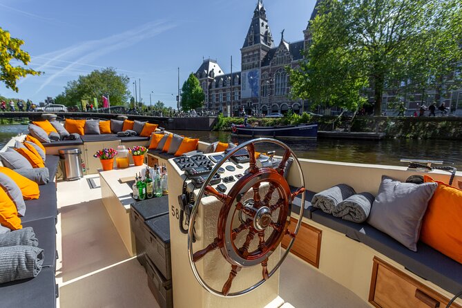 Amsterdam Light Festival: Saloon Boat Cruise + Hot Drinks & Bite - Amsterdam’s Light Festival from the water
