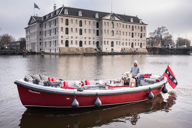 Amsterdam Light Festival: Saloon Boat Cruise + Hot Drinks & Bite - The boat: saloon comfort or open-air compromise