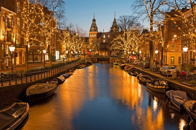 Amsterdam Light Festival Winter Walk with Stroopwafel Workshop - Flowers on the Singel canal