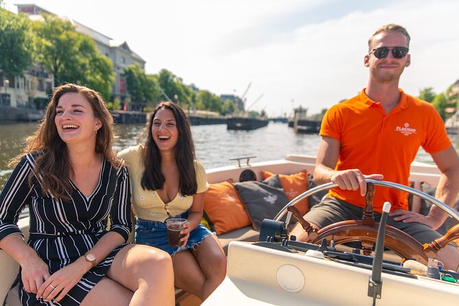 Amsterdam Luxury Canal Cruise + Unlimited Drinks & Bites option - Electric engines, open boats, and winter comfort