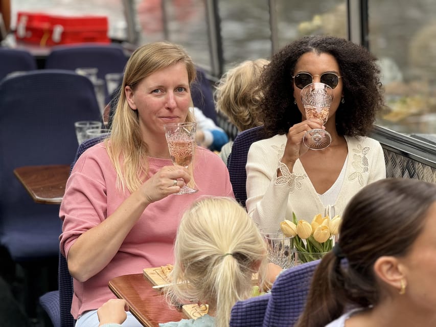 Amsterdam: Luxury Cheese & Wine Canal Cruise - What you see from a traditional Dutch boat