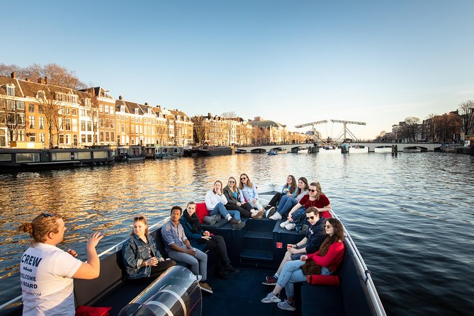 Amsterdam Open Boat Cruise in Old City Center with Live Guide - Beer, wine, coffee, and the value of the price