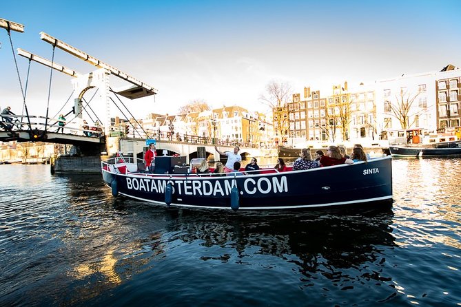Amsterdam Open Boat Cruise with Live Guide and Two Drinks - Drinks, blankets, umbrellas, and the seasonal setup