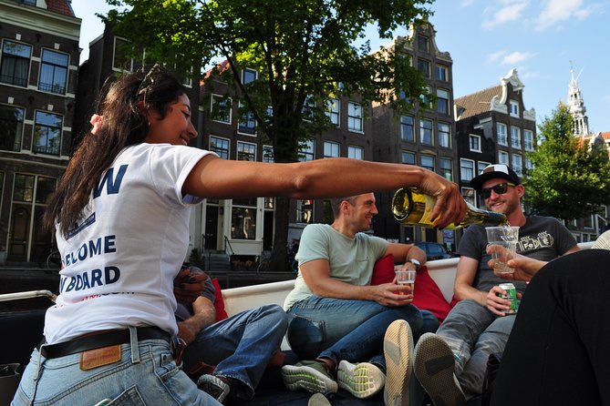 Amsterdam Open Boat Cruise with Live Guide and Two Drinks - How this compares with a larger canal boat