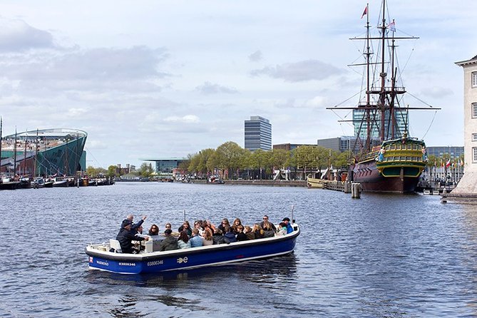 Amsterdam Open Boat Sightseeing Canal Cruise - Amstel Hotel and Amsterdam’s river connection