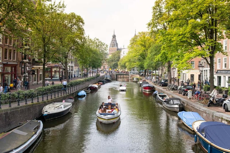 Amsterdam: Open Boat Tour of Canals with Expert Local Guide - What makes this canal cruise worth considering