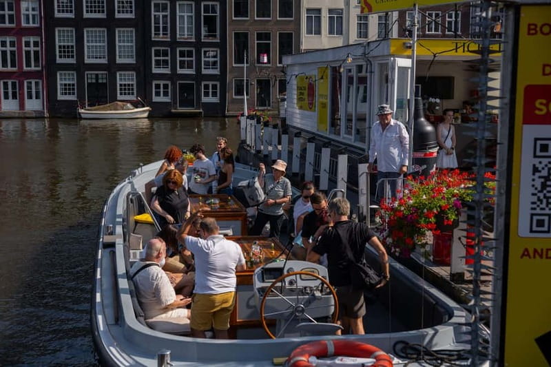 Amsterdam: Open Boat Tour of Canals with Expert Local Guide - Why an open boat changes the Amsterdam view