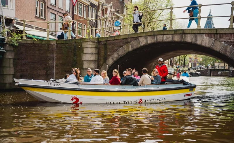 Amsterdam: Open Boat Tour of Canals with Expert Local Guide - The route: Amsterdam Centraal from the water