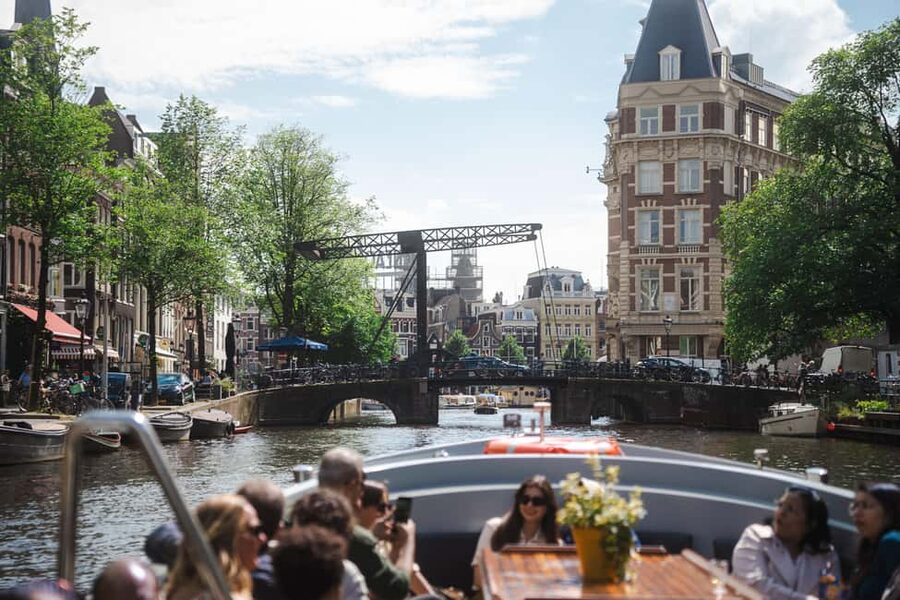 Amsterdam: Open Boat Tour of Canals with Expert Local Guide - What the $26 price really buys you
