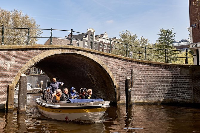 Amsterdam Open Boat Tour with Local Guide - Passing beneath the Bridge of Love