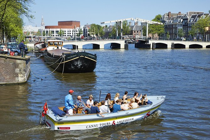 Amsterdam Open Boat Tour with Local Guide - What the boat feels like for an hour