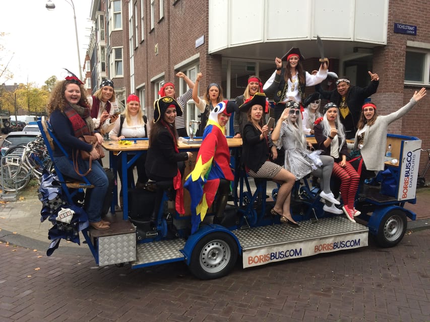 Amsterdam: Party Bike Tour with Beer - Weather protection and language options