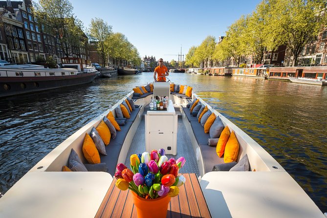 Amsterdam Private BBQ and Drinks Cruise With Onboard Chef - Following the canal route through old Amsterdam