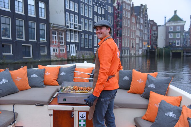 Amsterdam Private BBQ and Drinks Cruise With Onboard Chef - Central Amsterdam after dark and along the Amstel