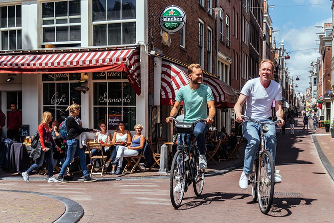 Amsterdam PRIVATE Bike Tour With Locals: Bike & Local Snack Included - Why a private bike ride works so well in Amsterdam