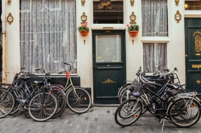 Amsterdam PRIVATE Bike Tour With Locals: Bike & Local Snack Included