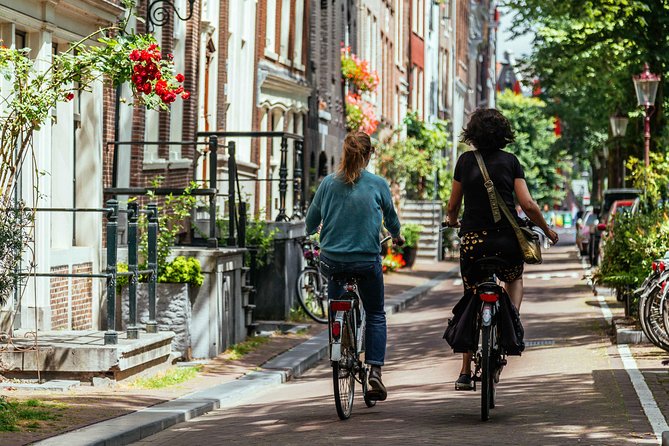 Amsterdam PRIVATE Bike Tour With Locals: Bike & Local Snack Included - Jordaan, markets, and streets beyond the checklist