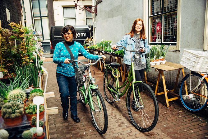 Amsterdam PRIVATE Bike Tour With Locals: Bike & Local Snack Included - City riding, countryside riding, or a mix