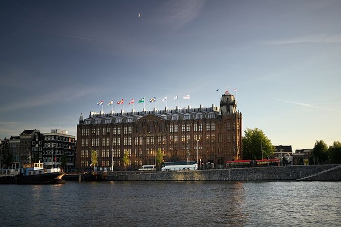 Amsterdam Private Boat Tour with Unlimited Drinks - The old center, Oude Kerk, and Central Station