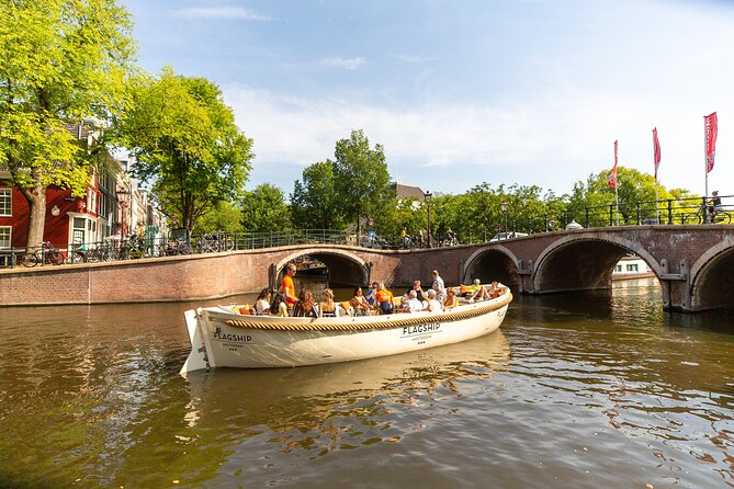 Amsterdam Private Boat Trip with Pizza and Unlimited Drinks - The older canals and quieter neighborhoods