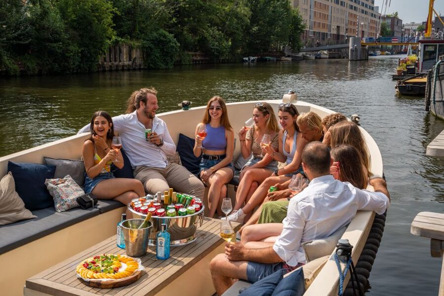 Amsterdam: Private Canal Booze Cruise with Unlimited Drinks - What the open bar really adds