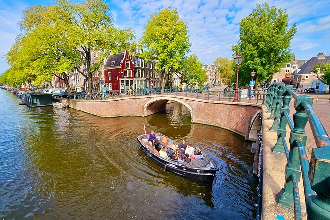 Amsterdam Private Canal Cruise – 90 Minutes through the Old City - Finishing Beneath the Skinny Bridge