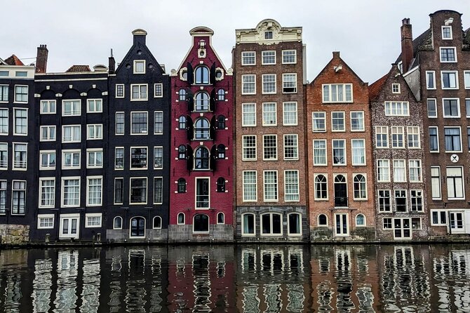 Amsterdam private city walking experience with a local - The canal houses explain how Amsterdam uses space