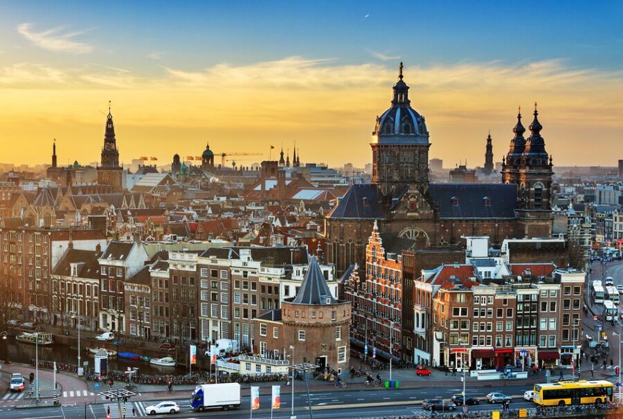 Amsterdam: Private Guided Walking Tour - Choosing Between Begijnhof, Flower Market, and Museums