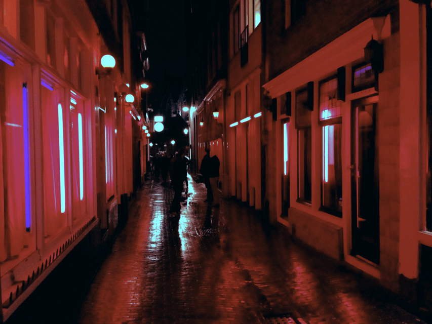 Amsterdam: Private Red Light District Tour in Spanish - The Condomerie and the walk toward Dam Square