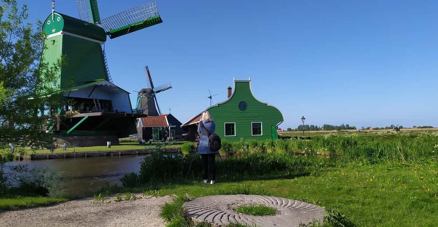 Amsterdam: Rainbow Rural Bike Tour With Local Gay Guide - The old windmill and the practical side of Dutch water