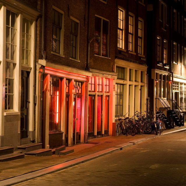 Amsterdam: Red Light District and Coffeeshop tour - Seeing the Red Light District beyond the neon