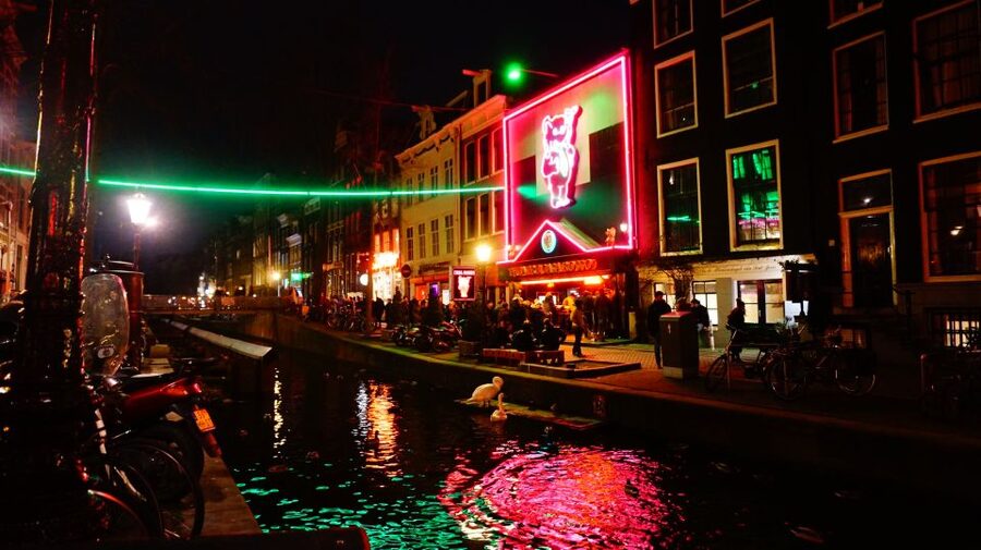 Amsterdam: Red Light District Exclusive Night Tour - Meeting near Saint Nicholas Basilica